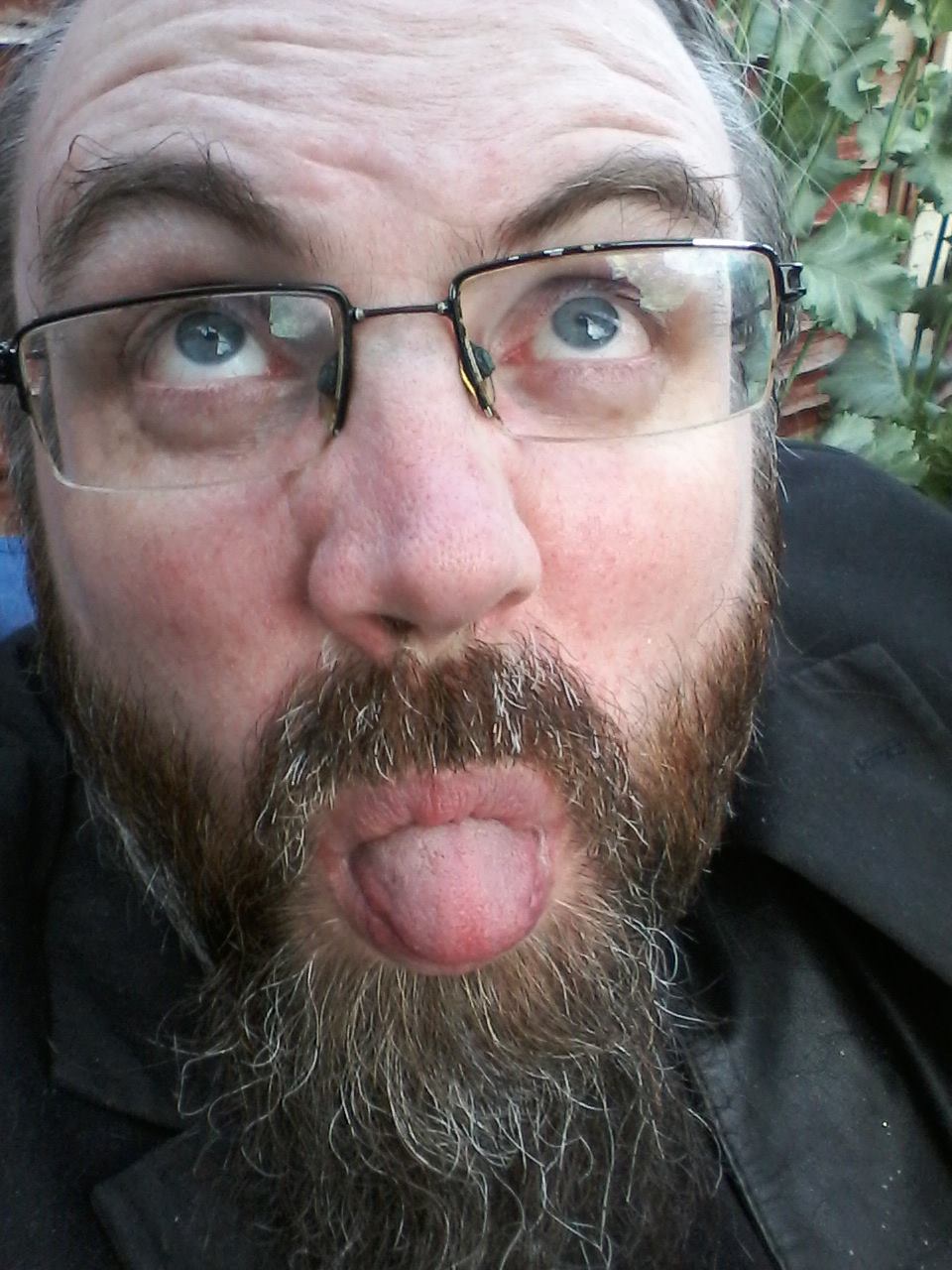 Image of Matthew Brown sticking his tongue out.